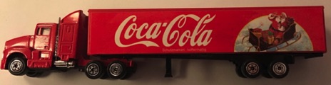 10110-2 € 5,00 coca cola vrachtwagen afb kerstman in arreslee 18 cm.jpeg